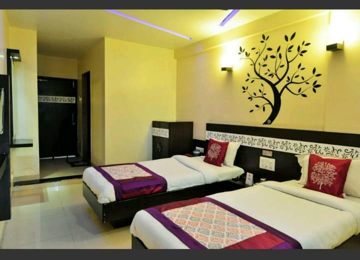 Skylawn Hotel Surat Exterior photo